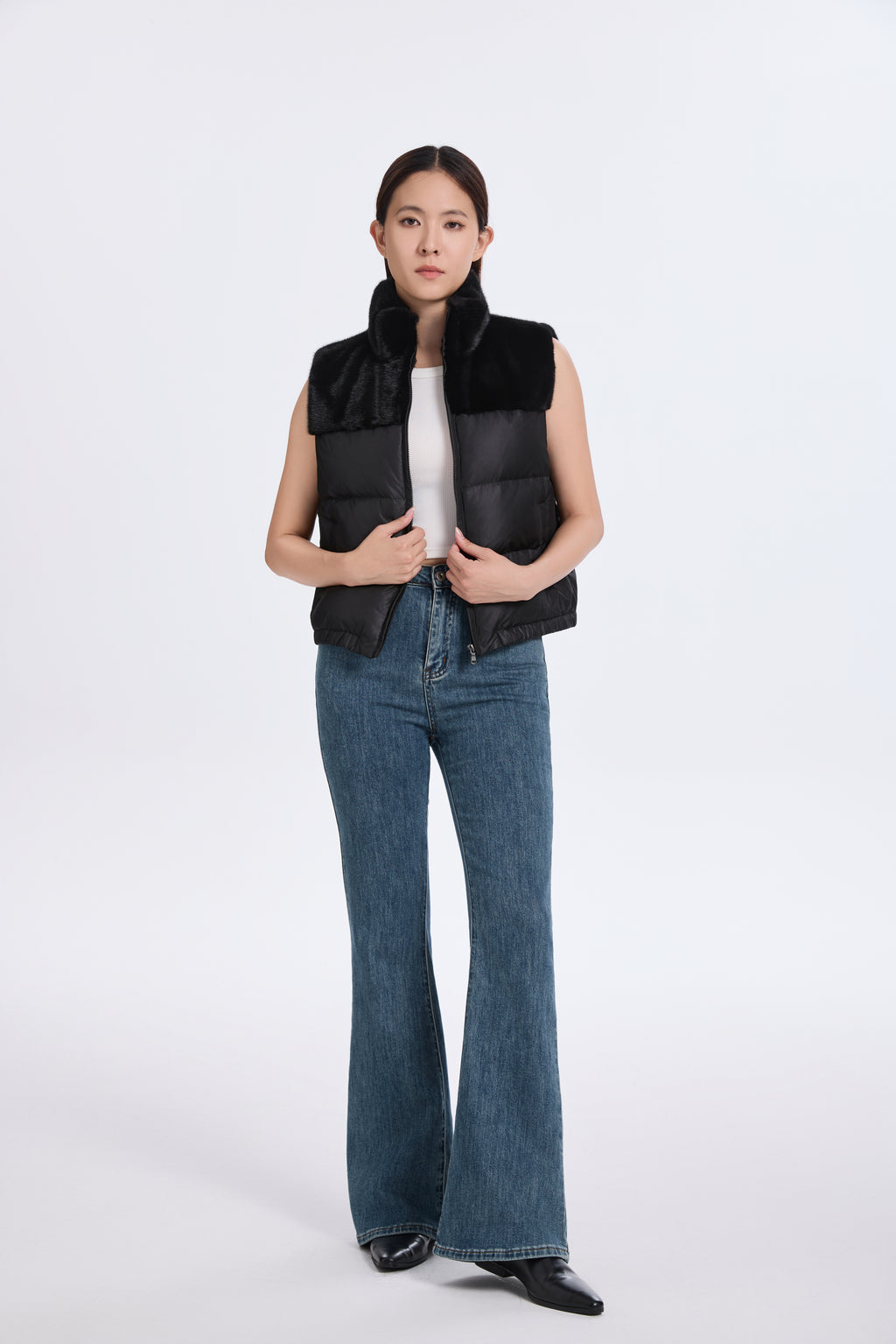 BLACK PADDING VEST WITH L.H MINK TRIMMING