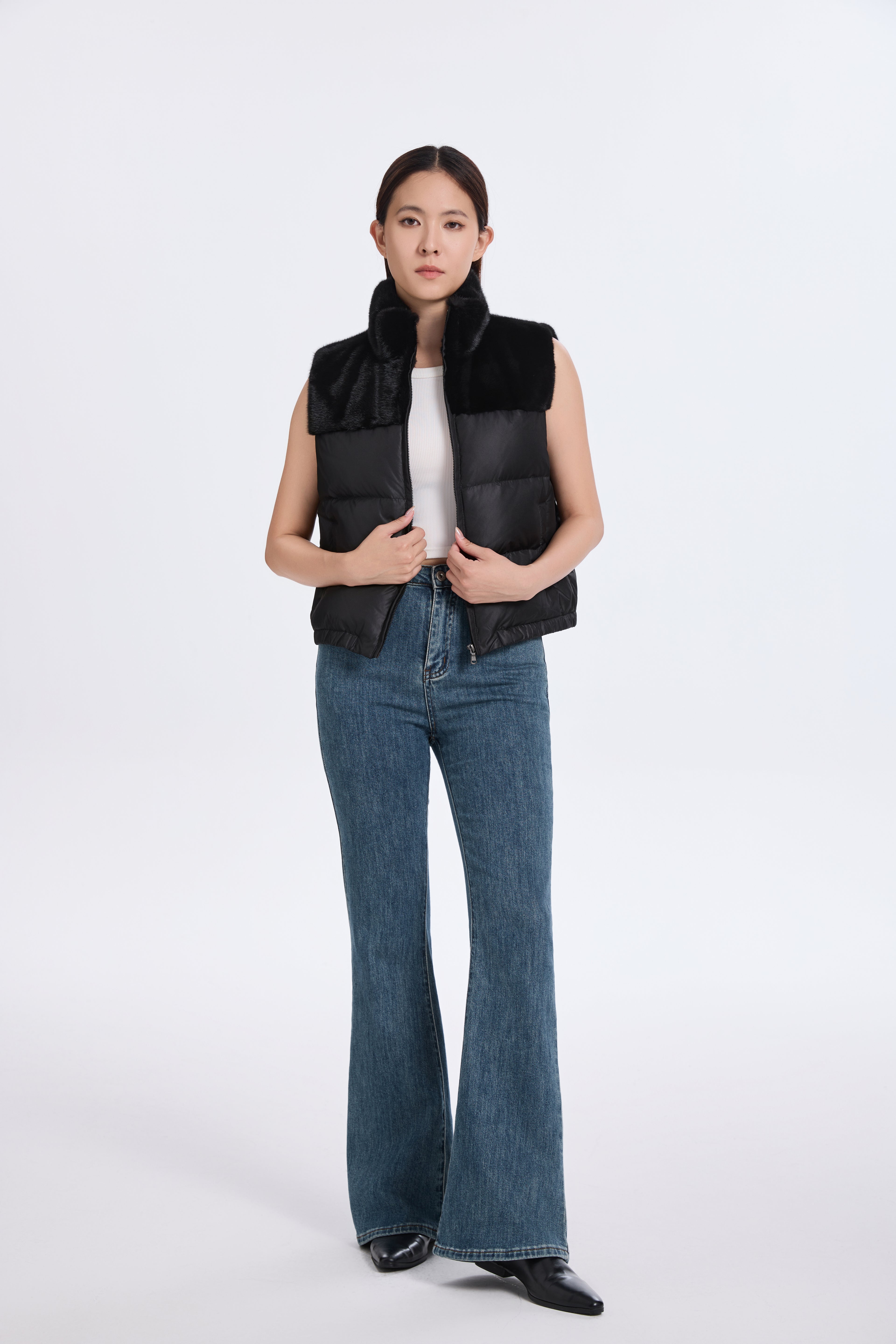 BLACK PADDING VEST WITH L.H MINK TRIMMING