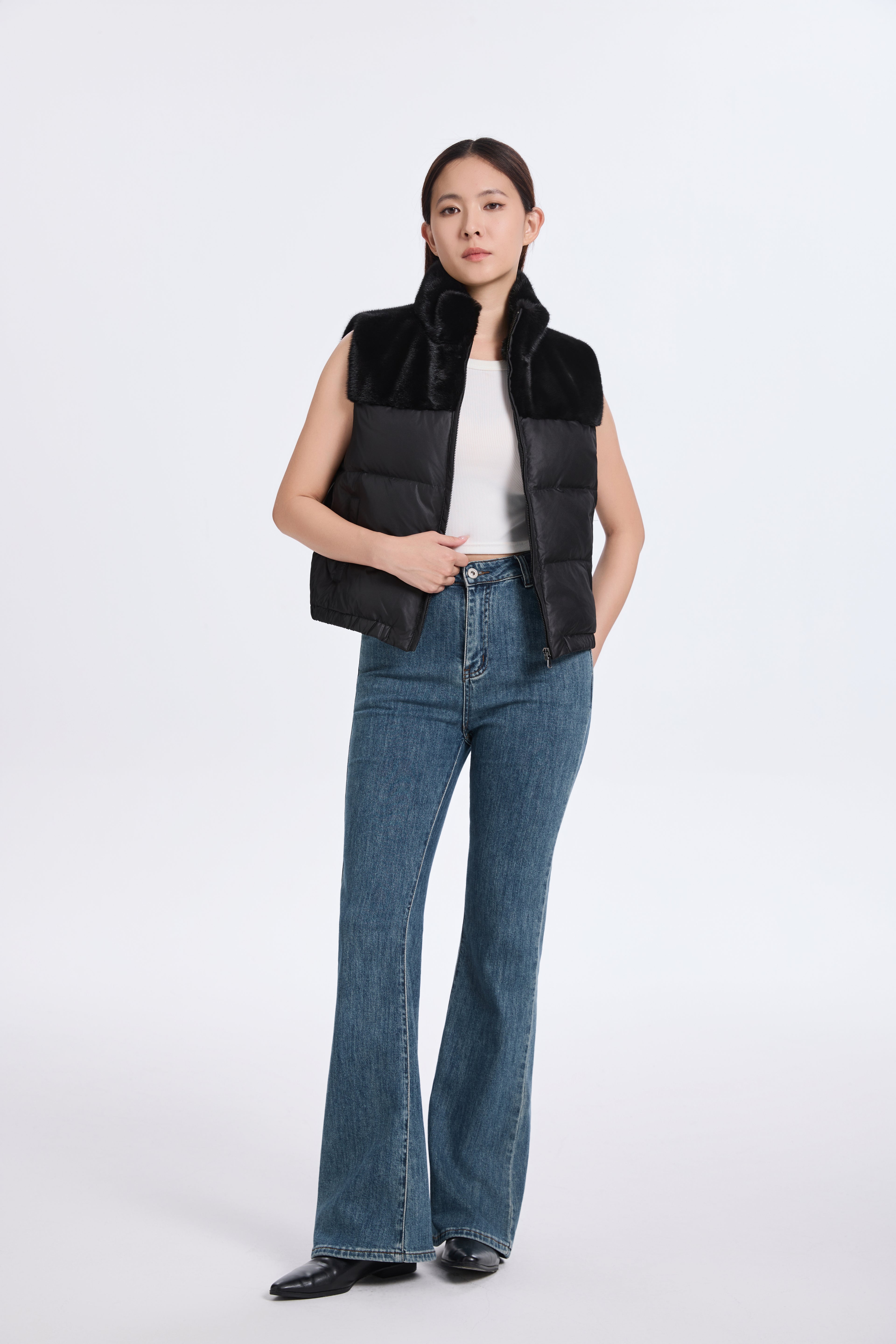 BLACK PADDING VEST WITH L.H MINK TRIMMING