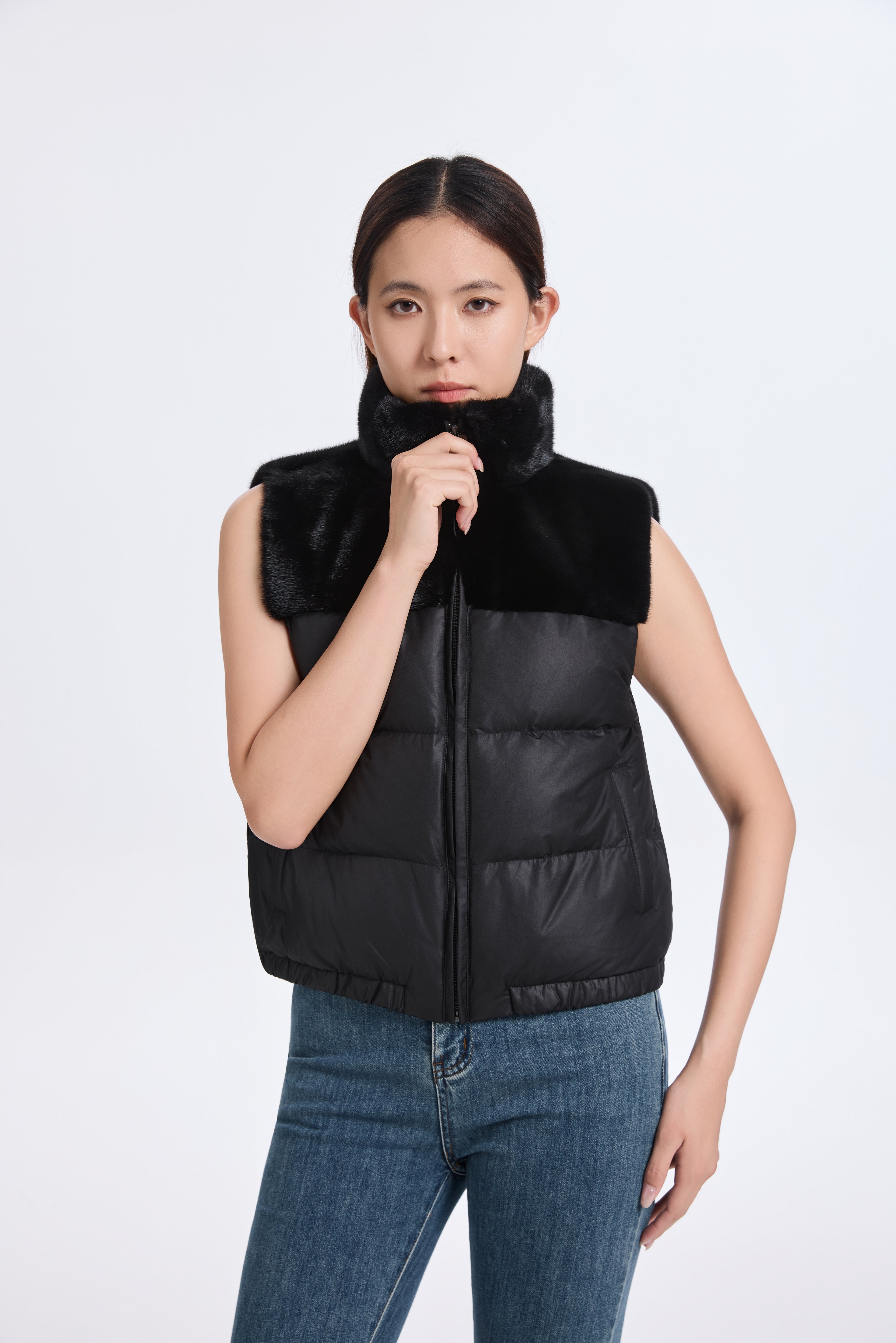 BLACK PADDING VEST WITH L.H MINK TRIMMING