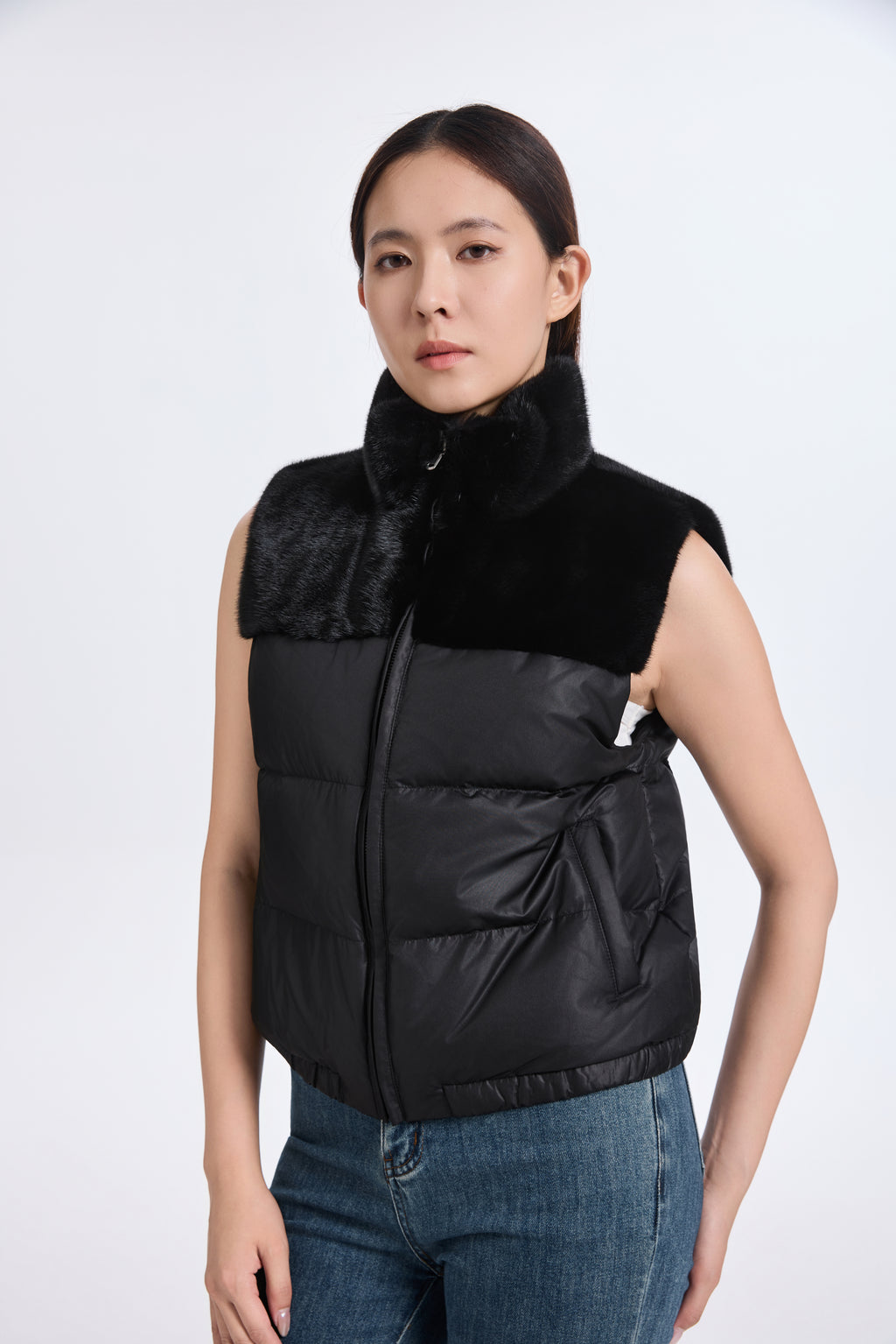 BLACK PADDING VEST WITH L.H MINK TRIMMING