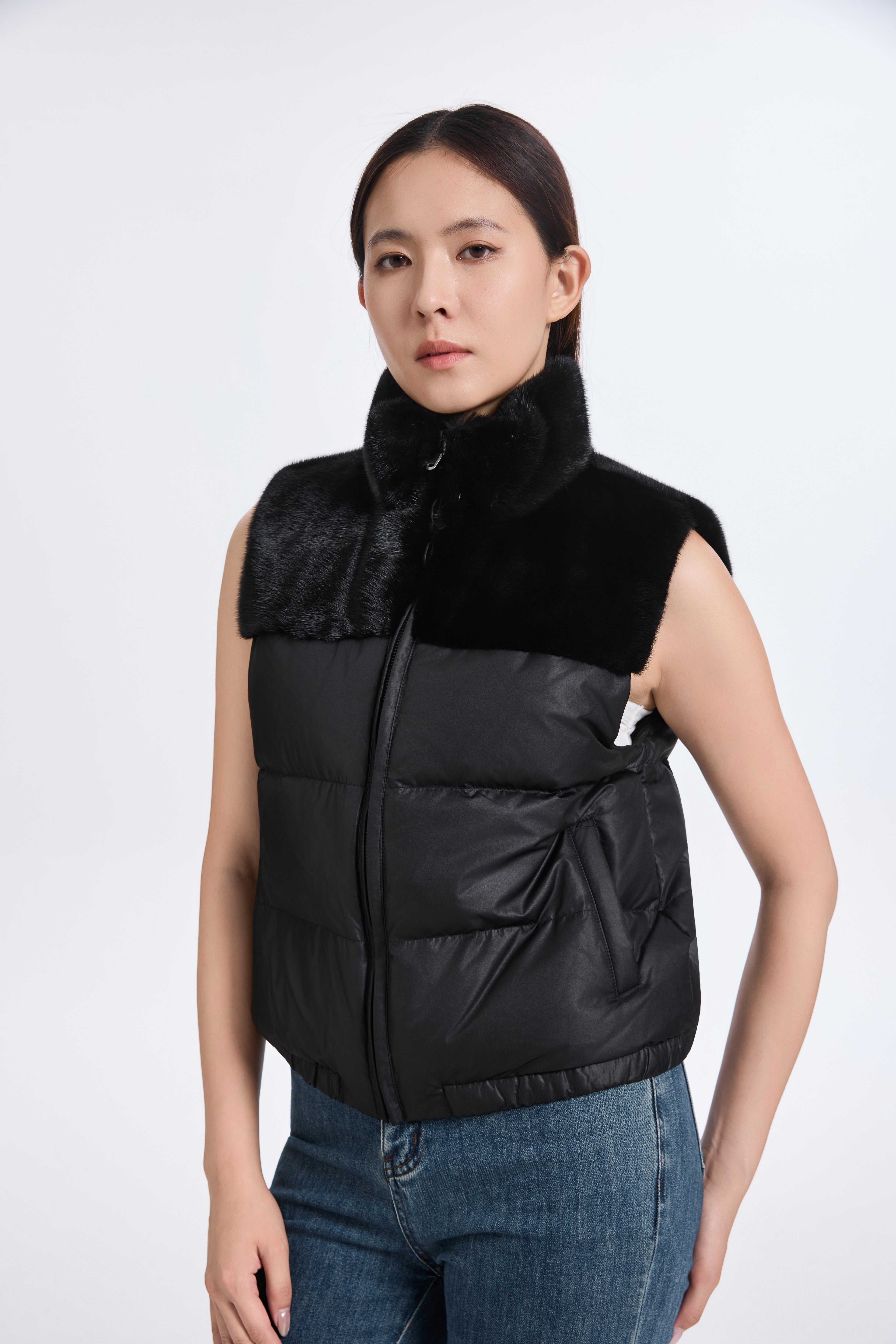 BLACK PADDING VEST WITH L.H MINK TRIMMING